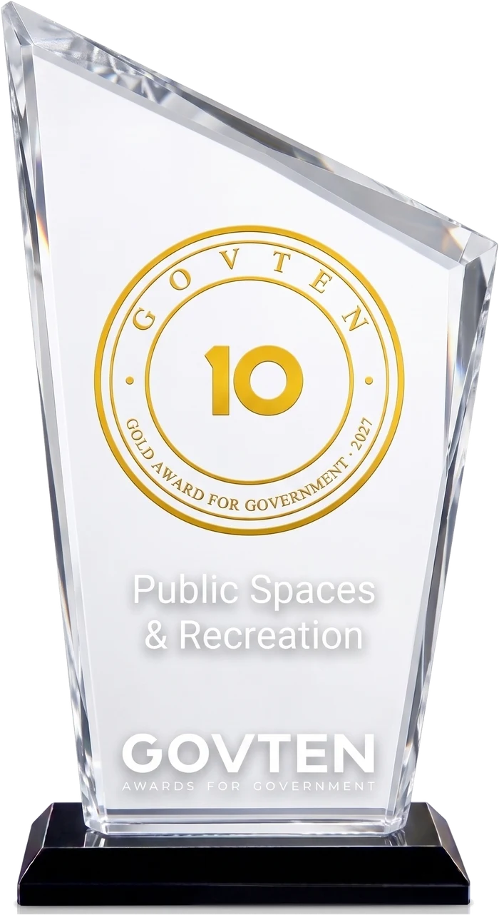 The GovTen Gold Award, shown against a plain background: crystal peak, black granite base, gold seal.