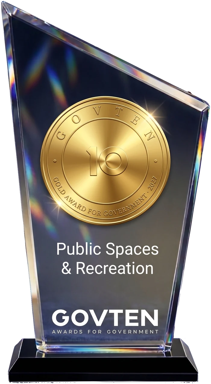 The GovTen Gold Award: an optical crystal peak on a black granite base, with a raised gold medallion, engraved Public Spaces & Recreation and the GovTen lockup.